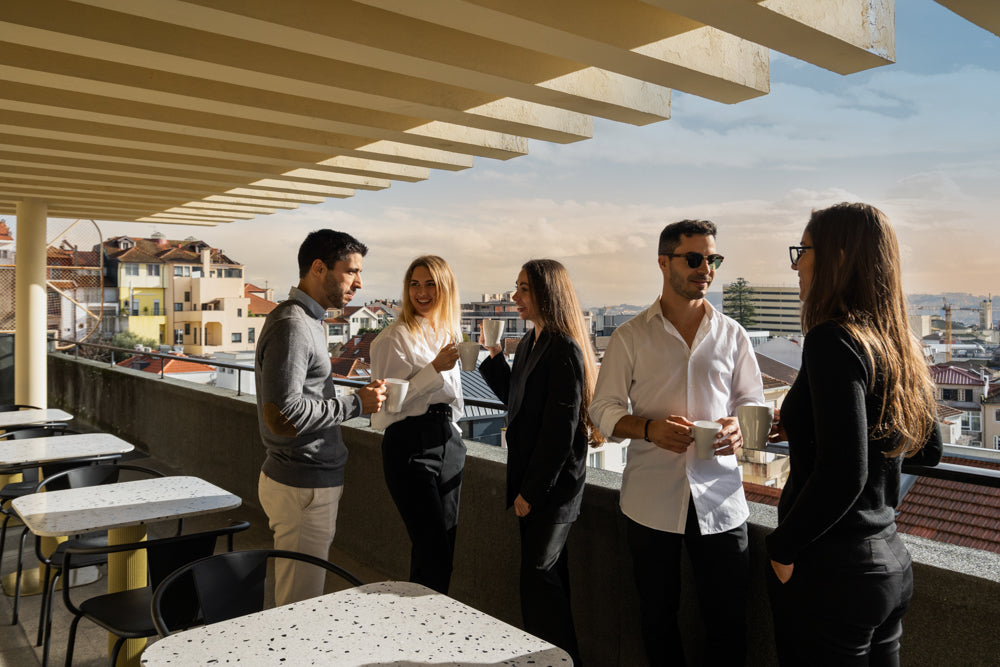 Host Wise Team relaxing on Sunny Rooftop