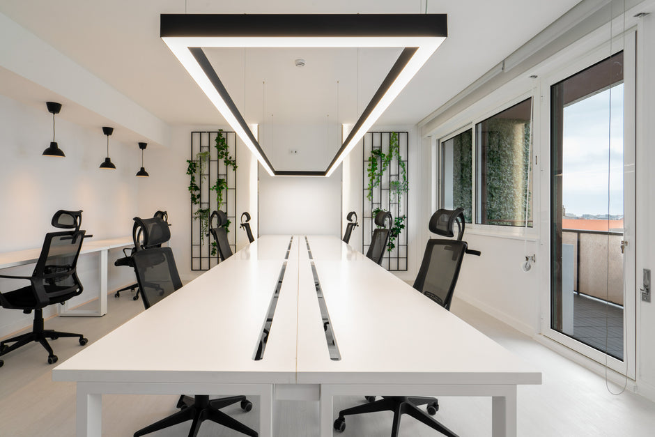 Open coworking area without people working at desks in Porto